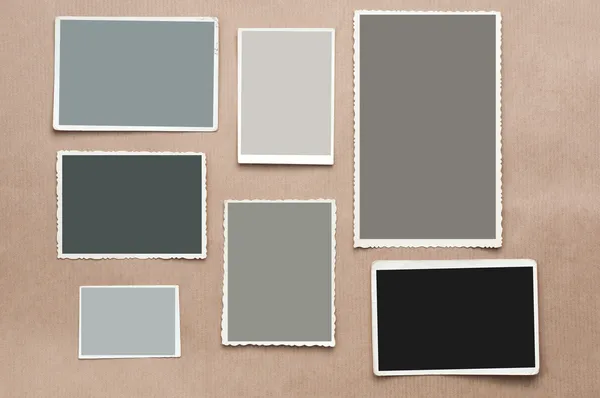 Definir velho, imagem em branco no fundo de papelão cinza — Fotografia de Stock