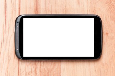 çalışma alanı çalışma masa üstünde hareket eden telefon ile. kırpma yolu ile masa üstünde hareket eden telefon