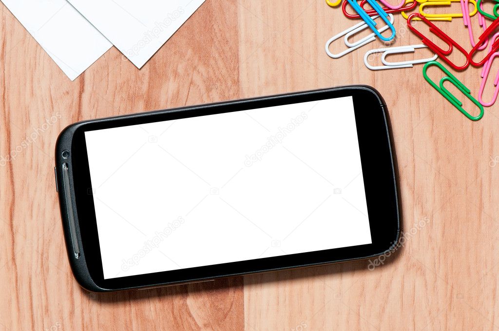 Smartphone auf einem Schreibtisch mit Clipping-Pfaden für ...