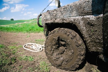 Offroad through muddy field clipart