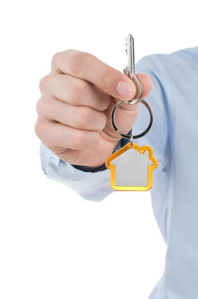 Ręka trzyma klucz dom — Zdjęcie stockowe