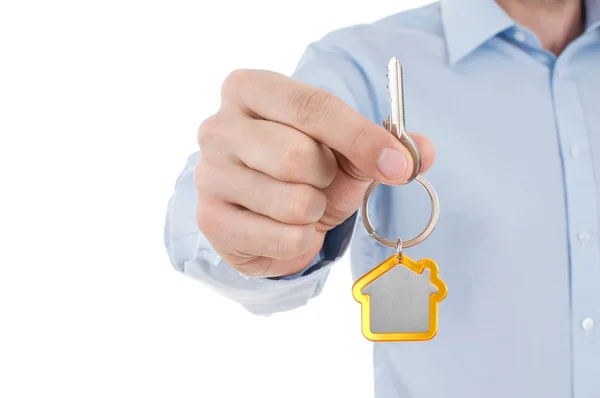 Hand holding house key — Stock Photo, Image