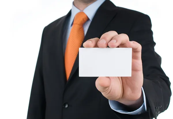 Geschäftsmann zeigt leere Visitenkarte isoliert auf Weiß Stockbild