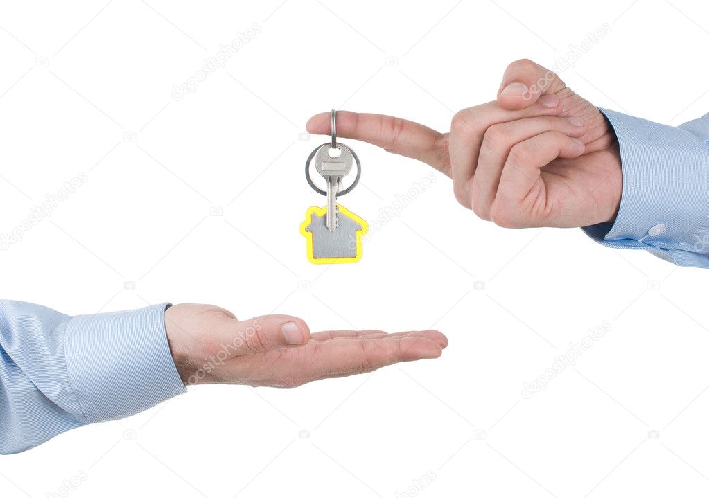 Elegant man Handing Over the House Keys
