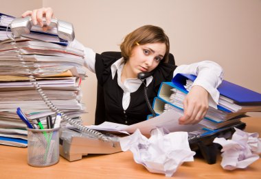 Young businesswoman with tons of documents clipart