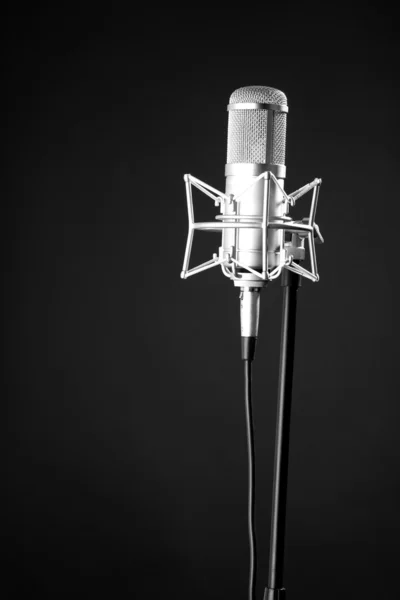 Microphone on the black background — Stock Photo, Image