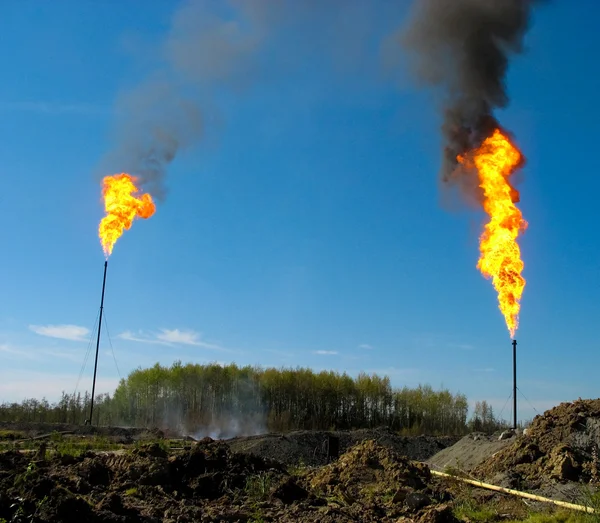 Two large oil flares — Stock Photo, Image