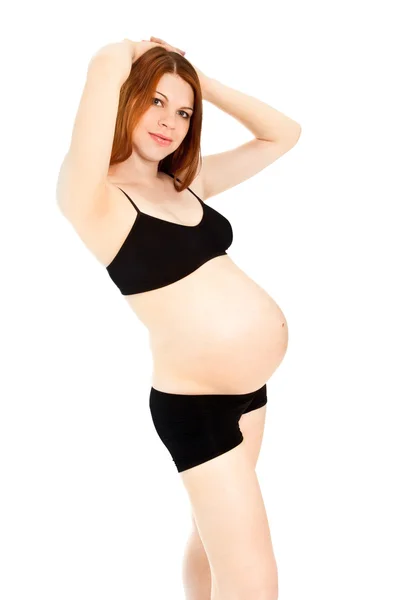 Kameraya bakarak güzel bir hamile kadın — Stok fotoğraf