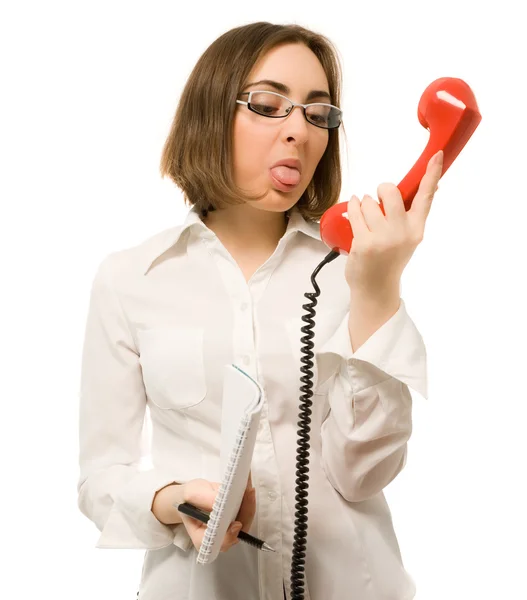 Secretario mostrando la lengua al teléfono — Foto de Stock