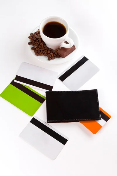 Šálek kávy, semen, cukroví a karet — Stock fotografie