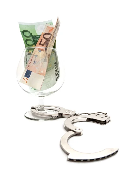 Cognac glass with money — Stock Photo, Image
