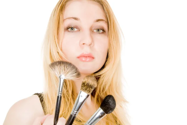 Blond woman with brushes — Stock Photo, Image