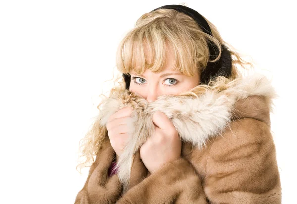 Blond girl in fur headphones — Stock Photo, Image