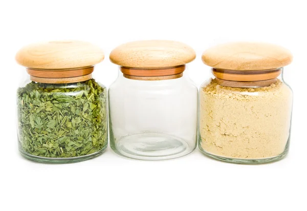 stock image Three glass cans with spices