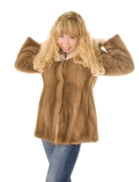Blond girl in fur coat — Stock Photo, Image