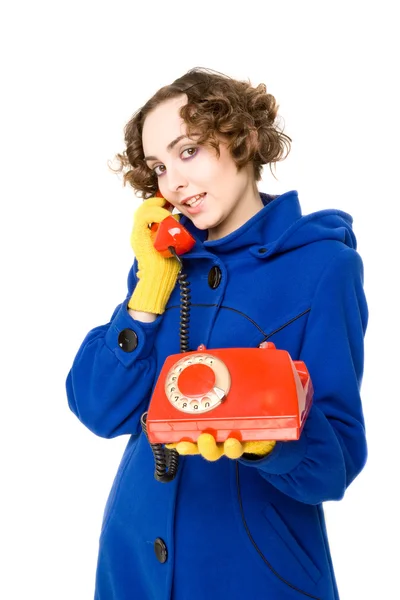 女孩与旧的红色电话 — 图库照片