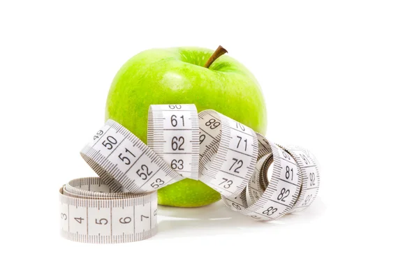 Picture of green apple and measure tape — Stock Photo, Image