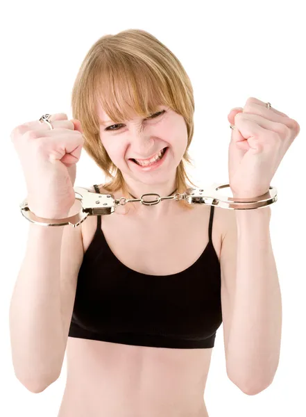 Блондинка в наручниках — стокове фото