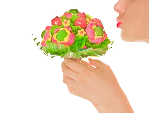 Woman's lips with sweet flower isolated on white — Stock Photo, Image