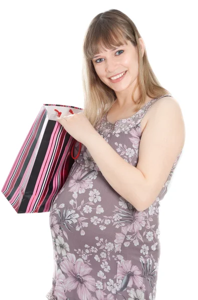 Mulher grávida com saco de compras — Fotografia de Stock