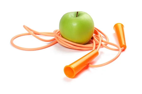 Uma maçã verde e uma corda — Fotografia de Stock