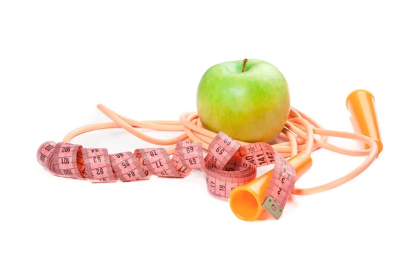 A green apple, tape measure and rope — Stock Photo, Image