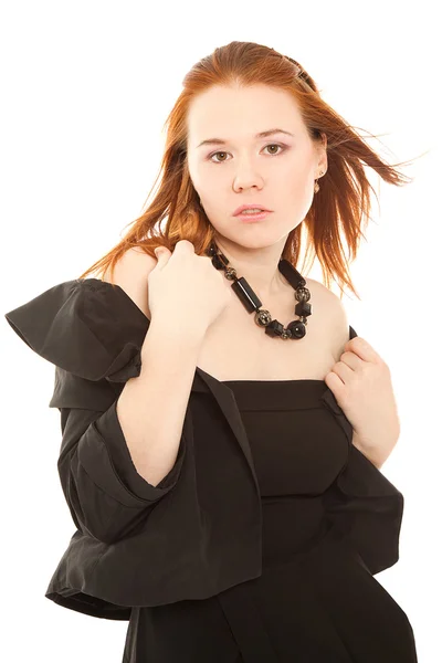 Mooie vrouw in zwarte jurk geïsoleerd — Stockfoto