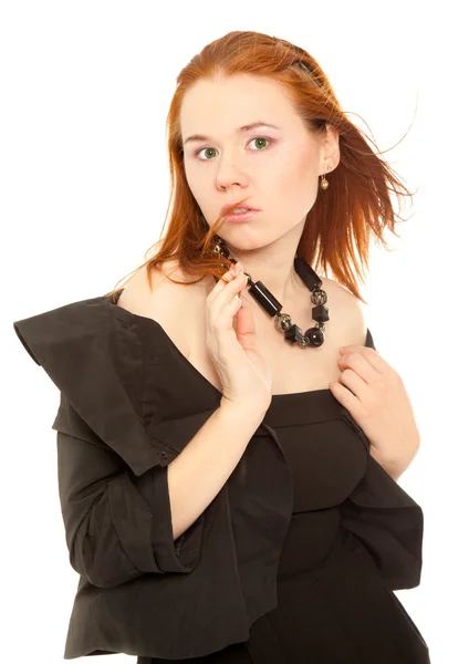 Mooie vrouw in zwarte jurk geïsoleerd — Stockfoto
