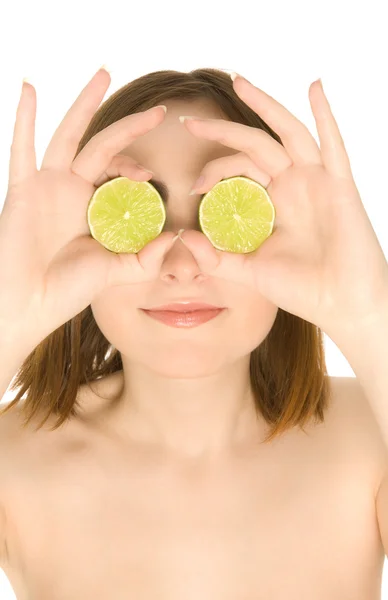 Funny woman with two piece of lime on her eyes — Stock Photo, Image