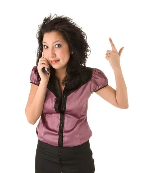 Surprised businesswoman calling by cellphone — Stockfoto