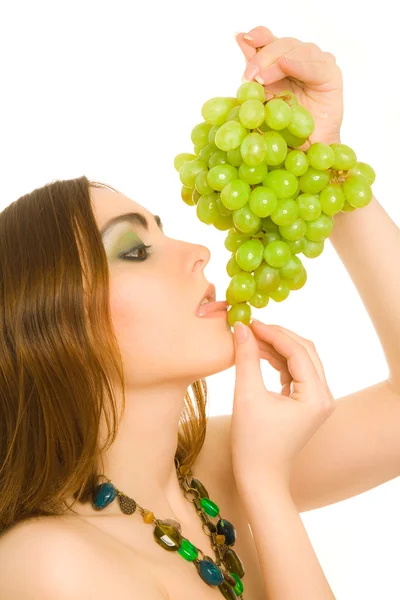 Woman with bunch of green grapes — Stok fotoğraf