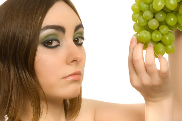 Woman with bunch of green grapes — Stock Photo, Image