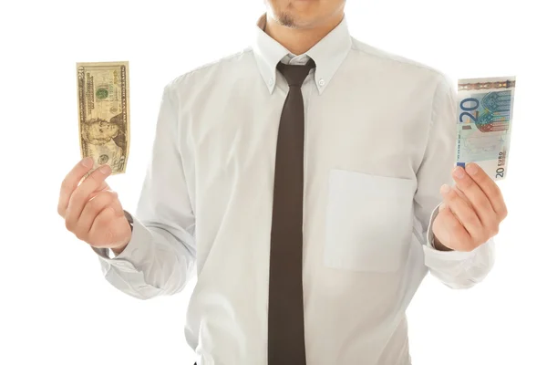 Empresario sosteniendo dos billetes en sus manos —  Fotos de Stock