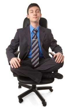 Young man in lotus pose clipart