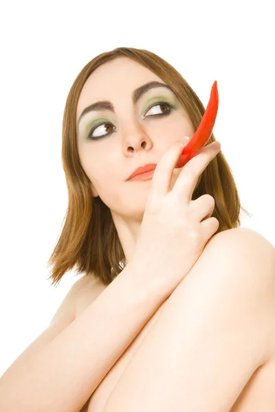 Woman with paprika in her mouth — Stock Photo, Image