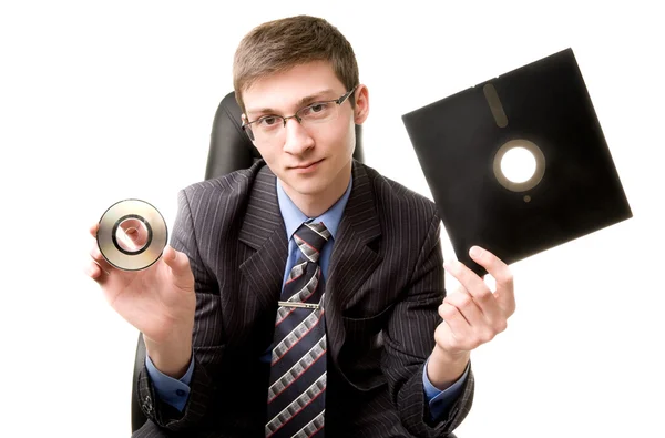 Young man with floppy disk — Stock Photo, Image