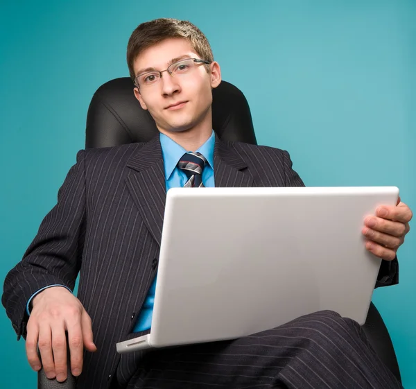Businessman sitting on chair — Stock Photo, Image