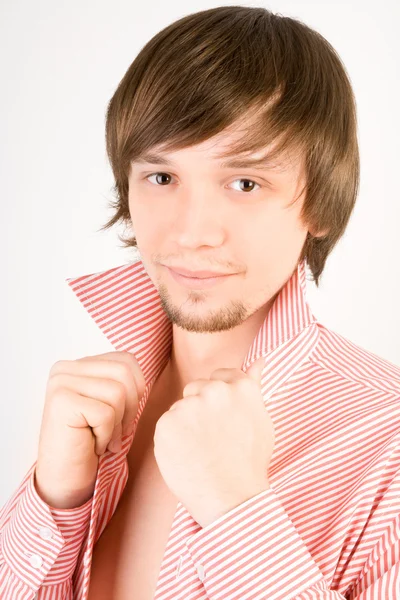 Beautiful self-confident man in shirt looking to the camera — Stock Photo, Image