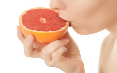 Picture of woman eat grapefruit isolated on white clipart