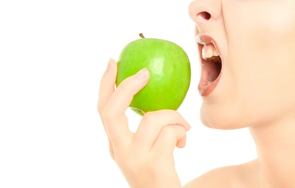 Woman holding an apple isolated on white — Stock Photo, Image
