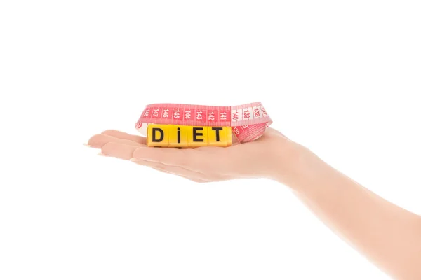 Bild på kvinna hand med ordet diet och måttband — Stockfoto