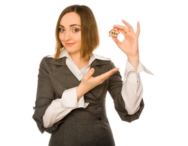 Picture of a young woman offering a house — Stock Photo, Image