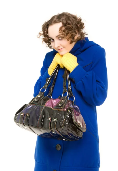 Happy curly-haired woman in coat — Stock Photo, Image