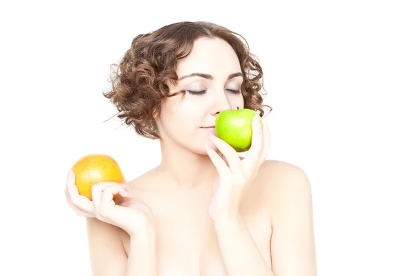 Beautiful curly girl with two fruits — Stock Photo, Image