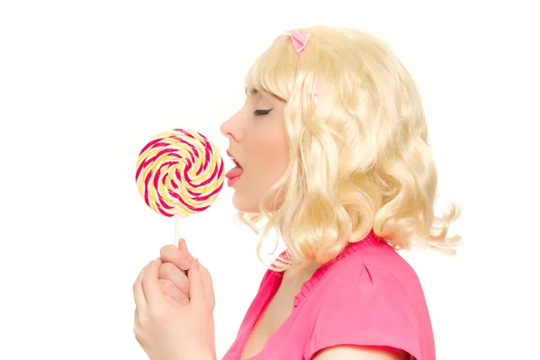 Slutna ögon flicka med lollipop — Stockfoto