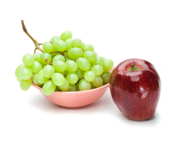 Un'uva e una mela — Foto Stock