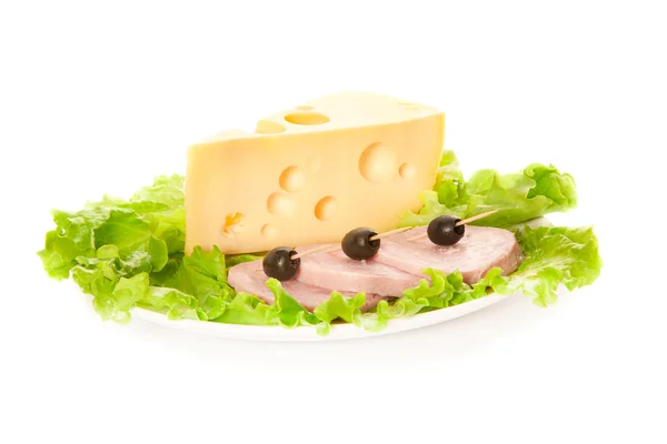 stock image A plate of lettuce, black olives and ham