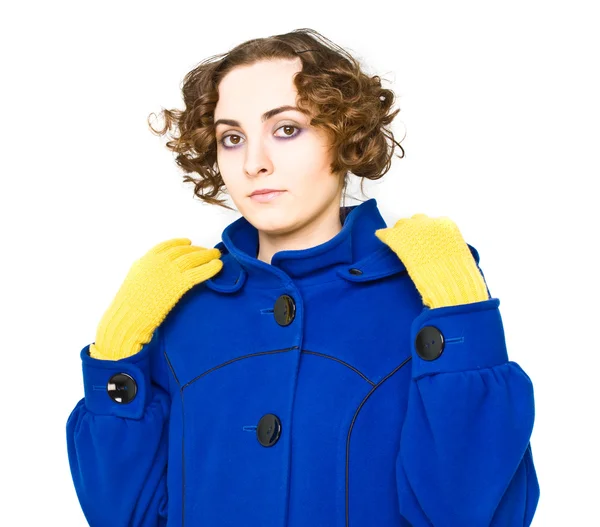 Кудрявая женщина в пальто — стоковое фото