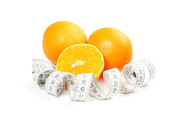 Picture of oranges and measure tape — Stock Photo, Image