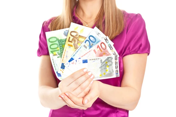 Woman holding euro in her hands — Stock Photo, Image
